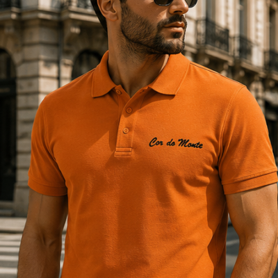 Orange polo shirt with Monte Color embroidery on the chest in green